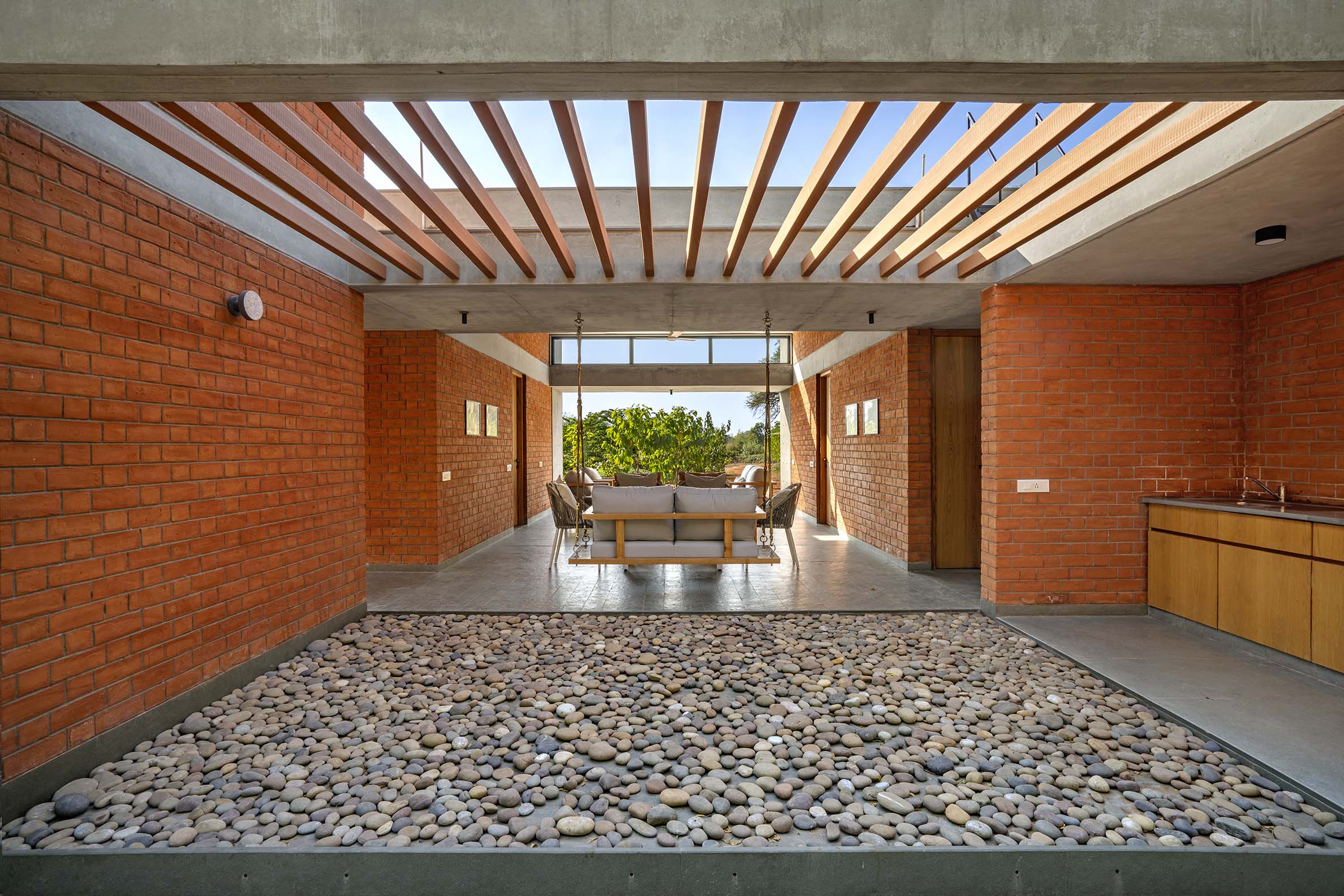 Verandah from the pebbled pergola courtyard